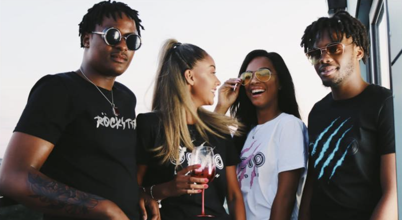 Group of friends wearing Ocho LDN shirts